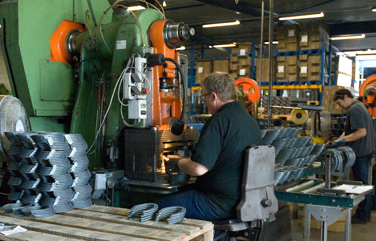 Finishing of newly produced horseshoes in the Mustad Friesland factory, Drachten